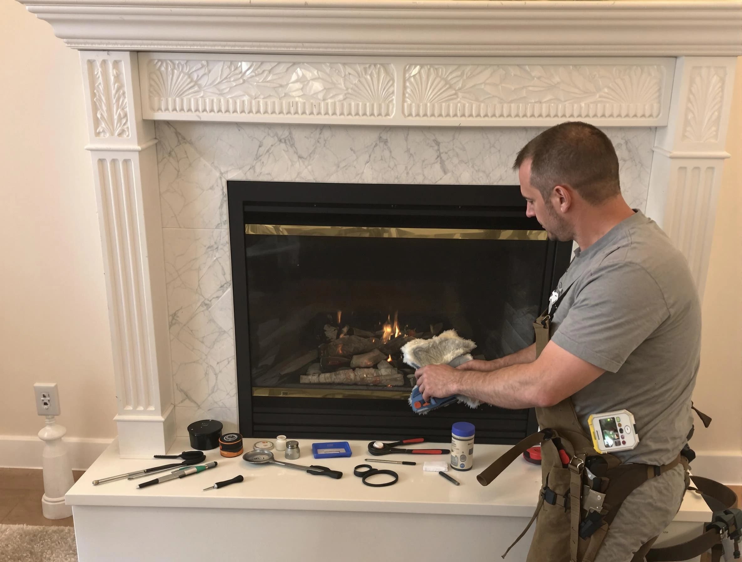 West Jordan Chimney Sweep performing fireplace maintenance in West Jordan, UT